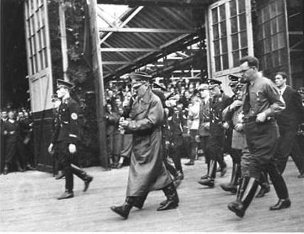 Adolf Hitler arrives at the Weitzer wagon factory in Graz